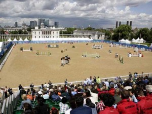 A cloudy sky adds drama to an equestrian competiton at Greenwich Park, London.