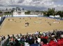 A cloudy sky adds drama to an equestrian competiton at Greenwich Park, London.