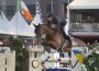 Kevin Staut clears a jump with his bay horse at the GCT.