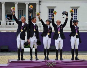 Germany's eventing team on the podium with its gold medals.