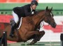 McLain Ward demonstrates classic form as he and Rothchild clear a vertical jump.