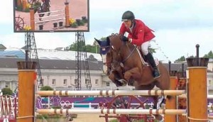 Rich Fellers and Flexible sail over an oxer.