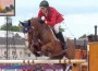 Rich Fellers and Flexible sail over an oxer.