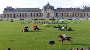 The Grand Prix field at Chantilly, FRA, is a carpet of emerald spread before the jewel that is Les Grandes Ecueries (The Grand Stables).