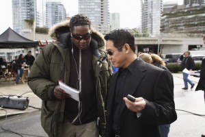 Director Philip Atwell and actor Jet Li on the set of "War."