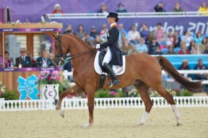 Adelinde Cornelissen and Parzival perform the collected canter.