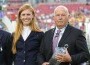 Saer Coulter looks stylish with her long strawberry-blonde hair and navy jacket at her award presentation ceremony.