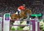 Beezie Madden and Simon jump before a crowd packed to the rafters.