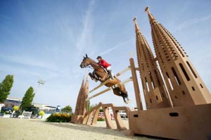 Eric Lamaze and Powerplay clear the architecturally interesting Sagrada Familia fence.